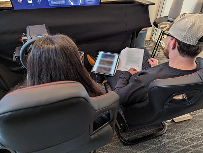 Interviewer showing participant blurred out concept artifacts