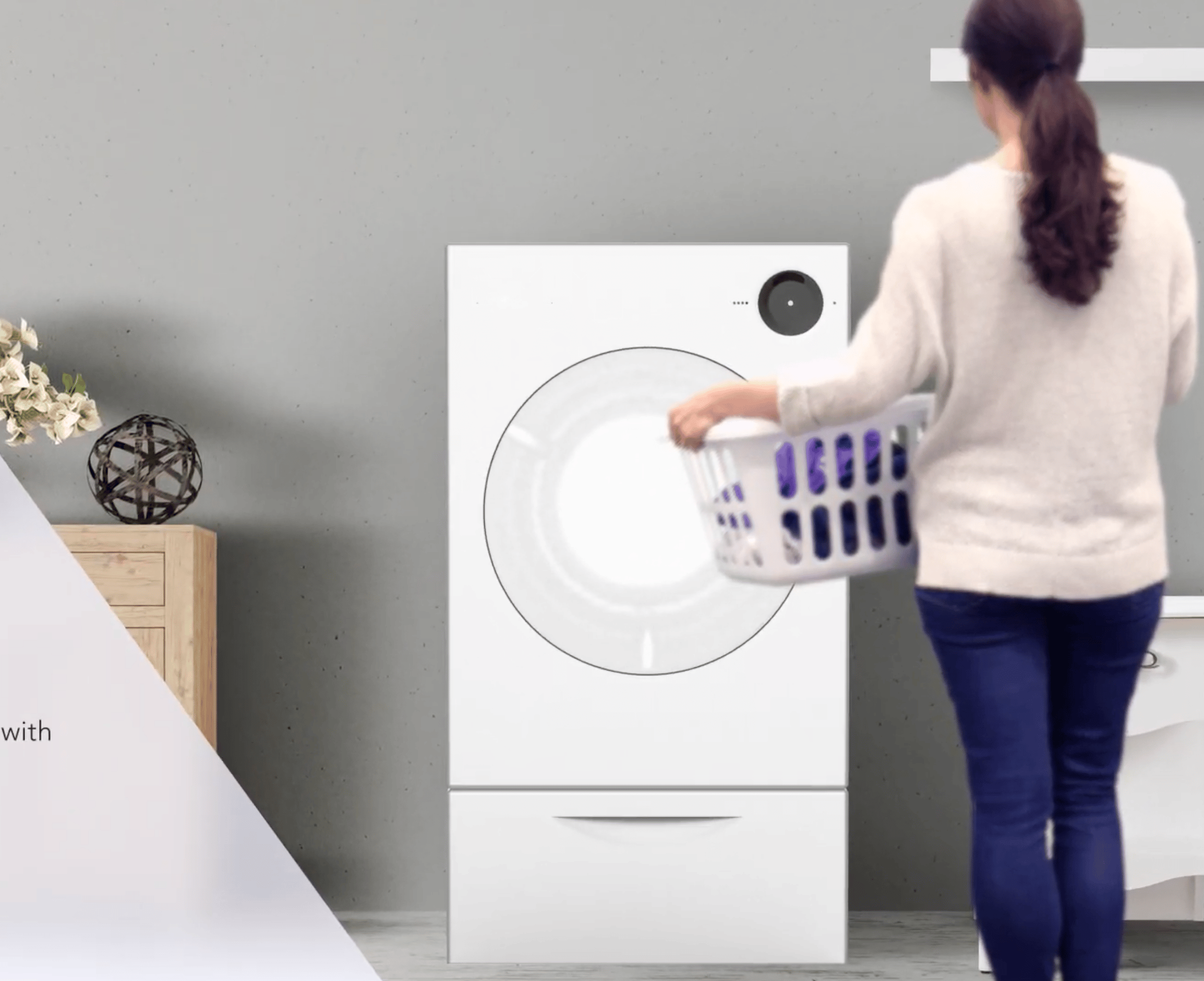 person sitting in a vehicle gaming chair holding a gaming steering wheel, looking at a screen showing a blurred prototype of the display